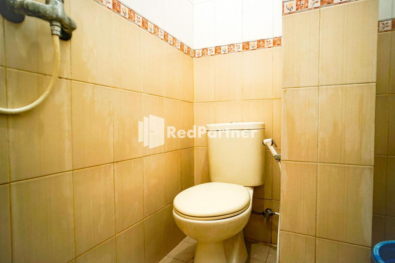 Hoki Homestay Redpartner Сурабая Экстерьер фото